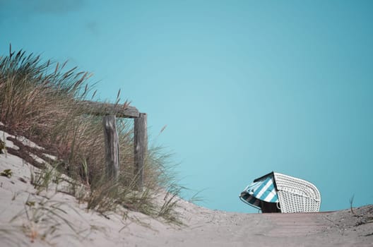 Passage to the beach on the Baltic Sea with beach basket