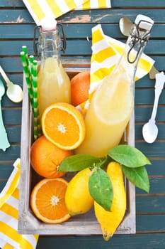 Homemade lemonade with fresh citrus fruits