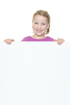 Studio recording of a happy girl with a white billboard against a white background