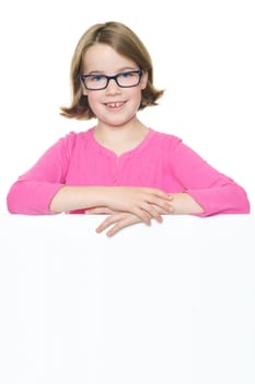 Studio recording of a happy girl with a white billboard against a white background