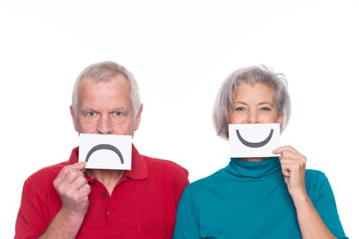Senior couple against a white background