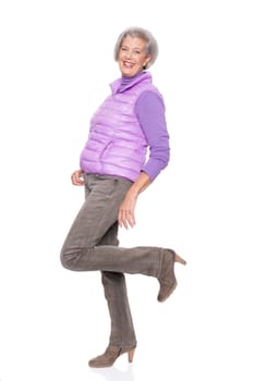 Studio recording of a middle-aged woman against a white background