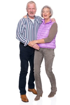 Happy senior couple against a white background