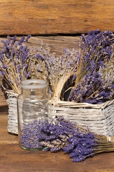 Dried lavender in a basket in front of a hut