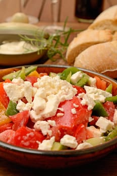 Mediterranean salad in an old ceramic bowl