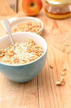 Healthy breakfast with oat flakes and honey flavoured spelt