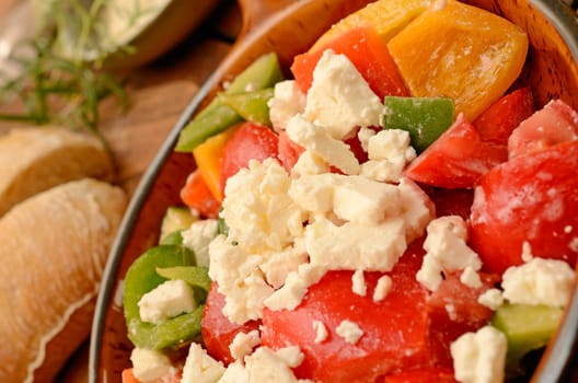 Mediterranean salad in an old ceramic bowl
