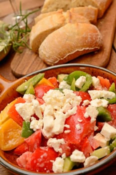 Mediterranean salad in an old ceramic bowl