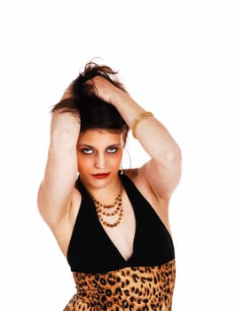A closeup picture of a beautiful young woman with her hands in her.hair, for white background..