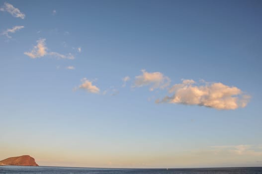 Cloudscape, Colored Clouds at Sunset near the Ocean