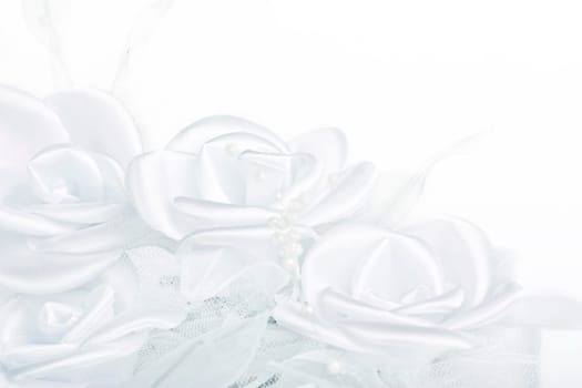 white textil roses from wedding decoration