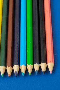New Pencils Textured Set on a Colored Background