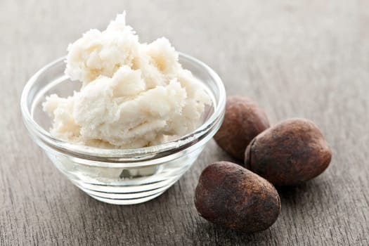Shea nuts and sheabutter in glass bowl
