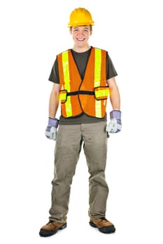 Happy male construction worker standing in safety vest and hard hat