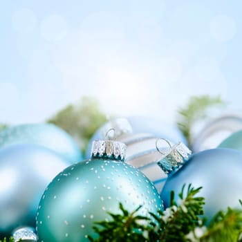 Christmas decorations and ornaments with blue background copy space