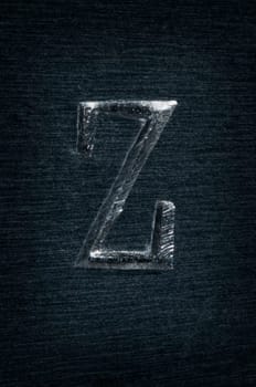 Macro image of the letter "Z"" in metal"