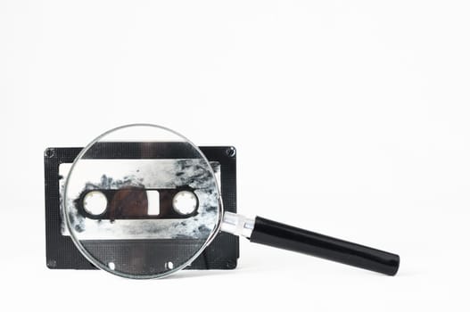 Ancient Vintage Used Musicassette over a White Background