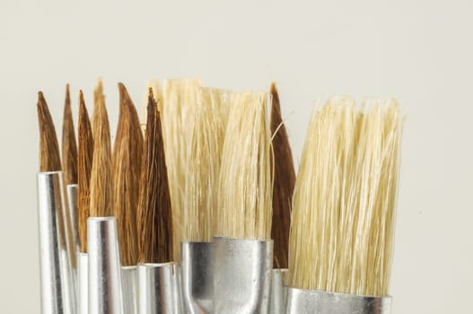 New Wooden Different Paintbrush Set Texture over a White Background