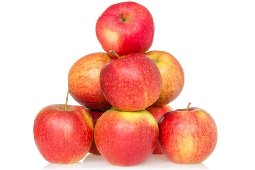 Pyramid of red apples isolated on white background