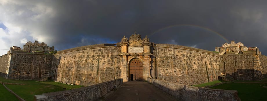 Entrance of Fort of Grace Elvas, south of Portugal. Panoramic shot with rainbow