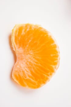 Vibrant mandarin fruit on a white background.