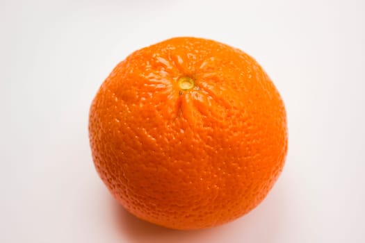 Vibrant mandarin fruit on a white background.