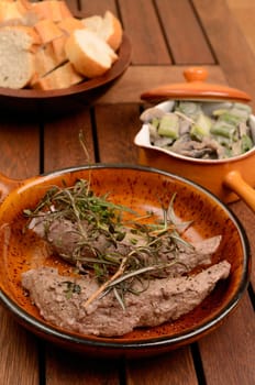 Filet of lamb with fried mushrooms and spring onions