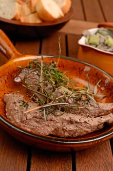 Filet of lamb with fried mushrooms and spring onions
