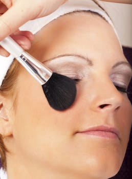 Young woman relaxes during cosmetic treatment