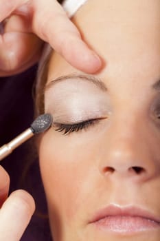 Young woman relaxes with the beautician