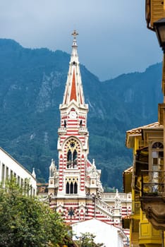 Beautiful red and white striped El Carmen church in the historic center of Bogota, Colombia