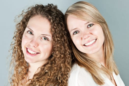 Portrait of two pretty caucasian young women