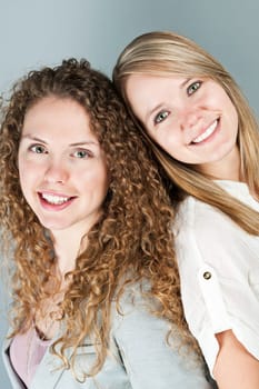 Portrait of two pretty caucasian young women
