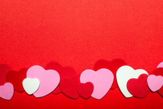 Border of romantic red pink and white hearts for Valentines day