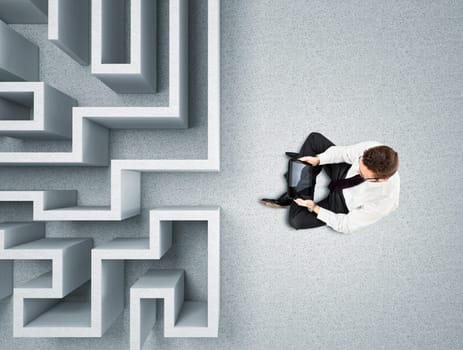 businessman and 3d abstract maze