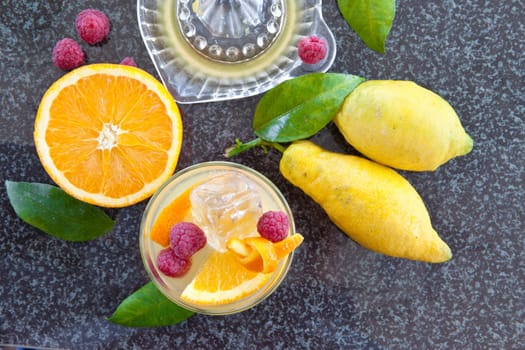 Lemonade in glazes of fresh lemons and oranges with ice cream