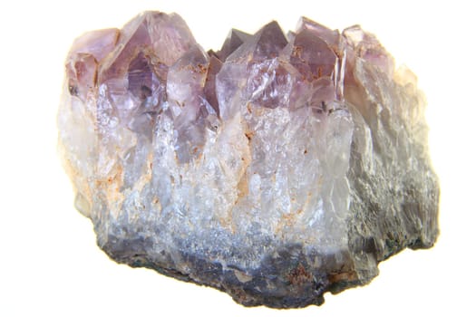Amethyst crystals against a white background