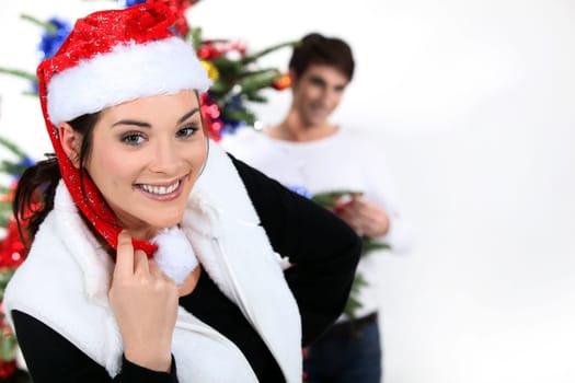 Couple with a Christmas tree
