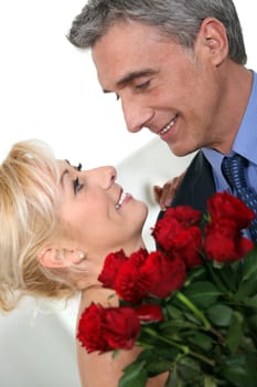 Romantic couple with red roses