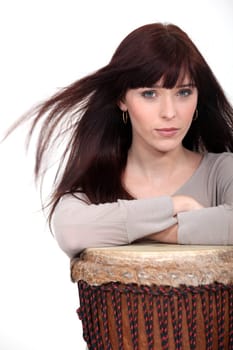 Attractive brunette with bongo