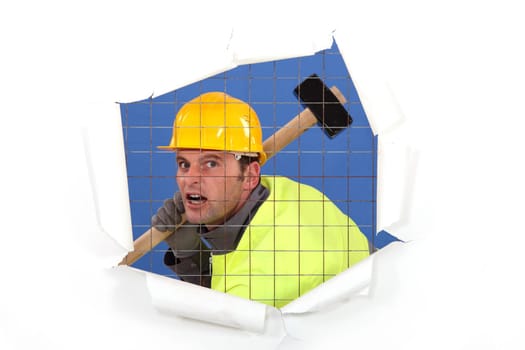 Construction worker with a sledgehammer