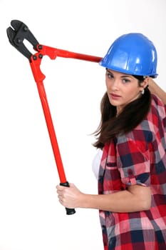 Woman with a pair of bolt cutters