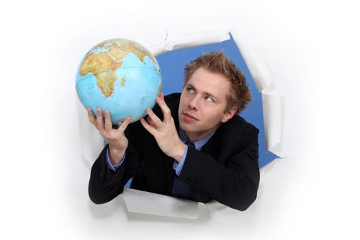 Man holding globe