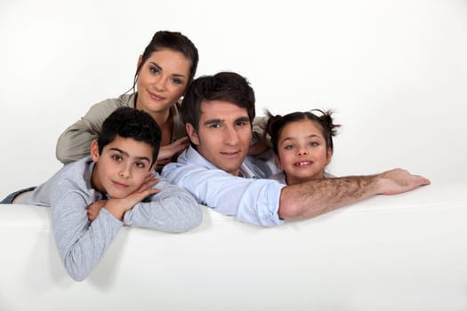 Family sat on couch