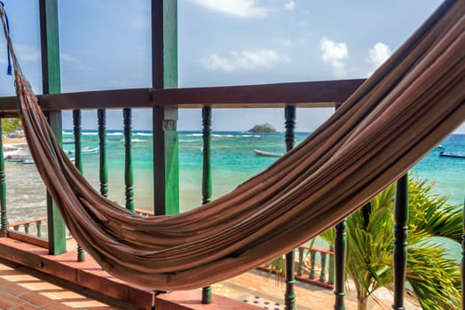 Hammock on a balcony overlooking the Caribbean Sea in Capurgana, Choco in Colombia