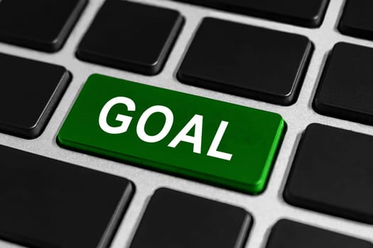 green goal button on keyboard, business concept