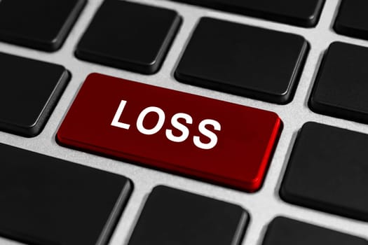 red loss button on keyboard, business financial concept