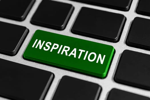 green inspiration button on keyboard, business financial concept