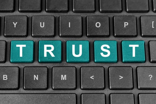 trust pastel turquoise word on keyboard