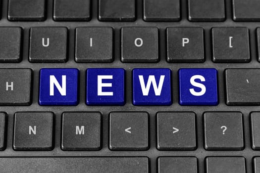 News blue word on keyboard